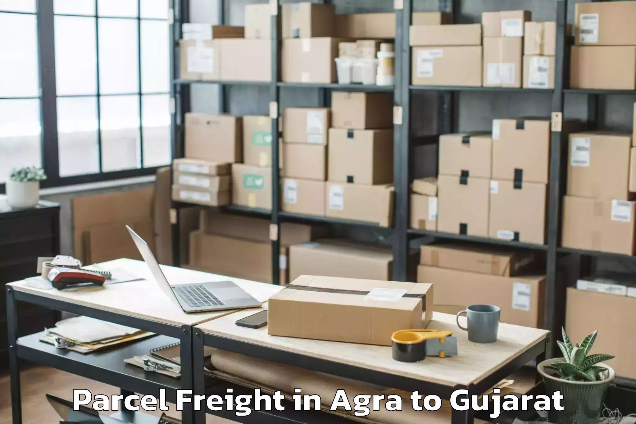 Agra to Bhanvad Parcel Freight